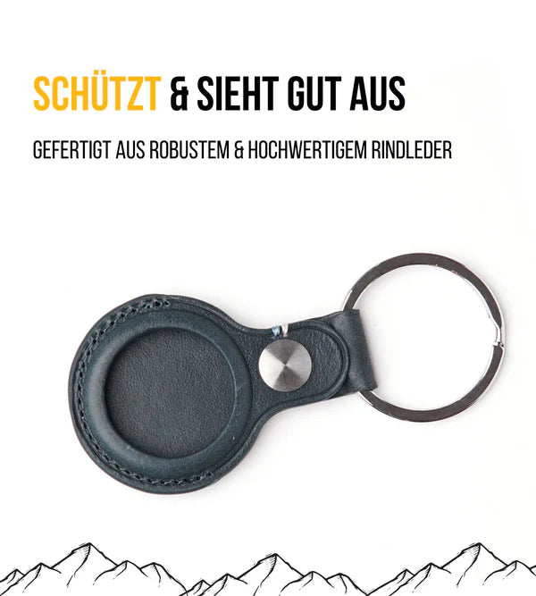 Airtag Hülle in blauen Leder, dargestellt auf weißem Hintergrund.