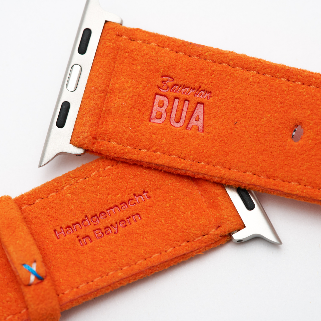 Oranges Alcantara Armband für Apple Watch Ultra mit Bavarian Bua Logo und handgemachter Prägung aus Bayern